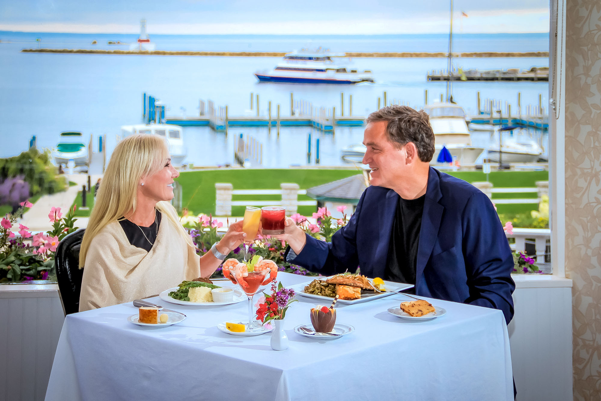 ouple having a romantic dinner at the 1852 grill room mackinac island